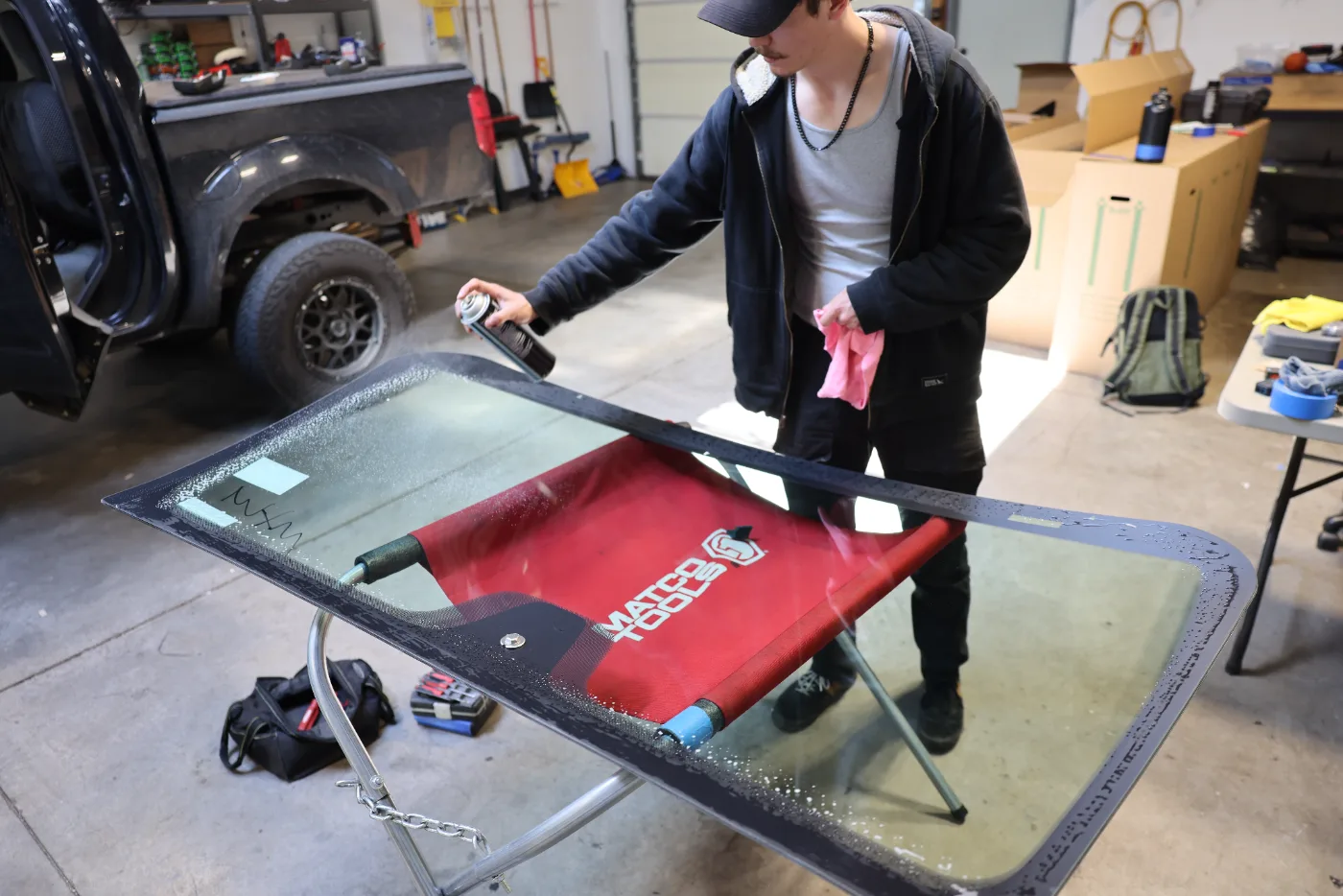 Auto Glass Technician Installing a Windshield in Basalt, CO